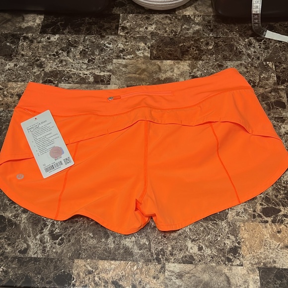 LULULEMON SPEED UP LOW RISE SHORT 2.5” SIZE 12 ORANGE COLOR NWT - Picture 4 of 6